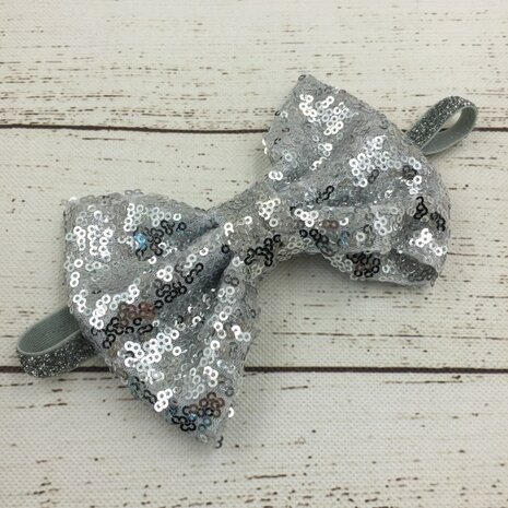 Glitter strik haarband Stretch Zilver