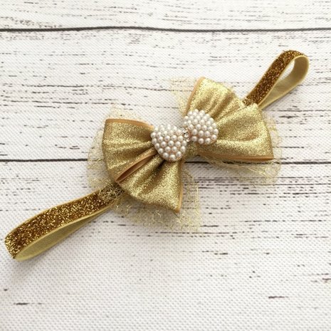 Gouden strik haarband