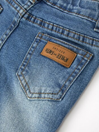 Flairpants Meisjes denim boek met ruches en uitlopende pijpen